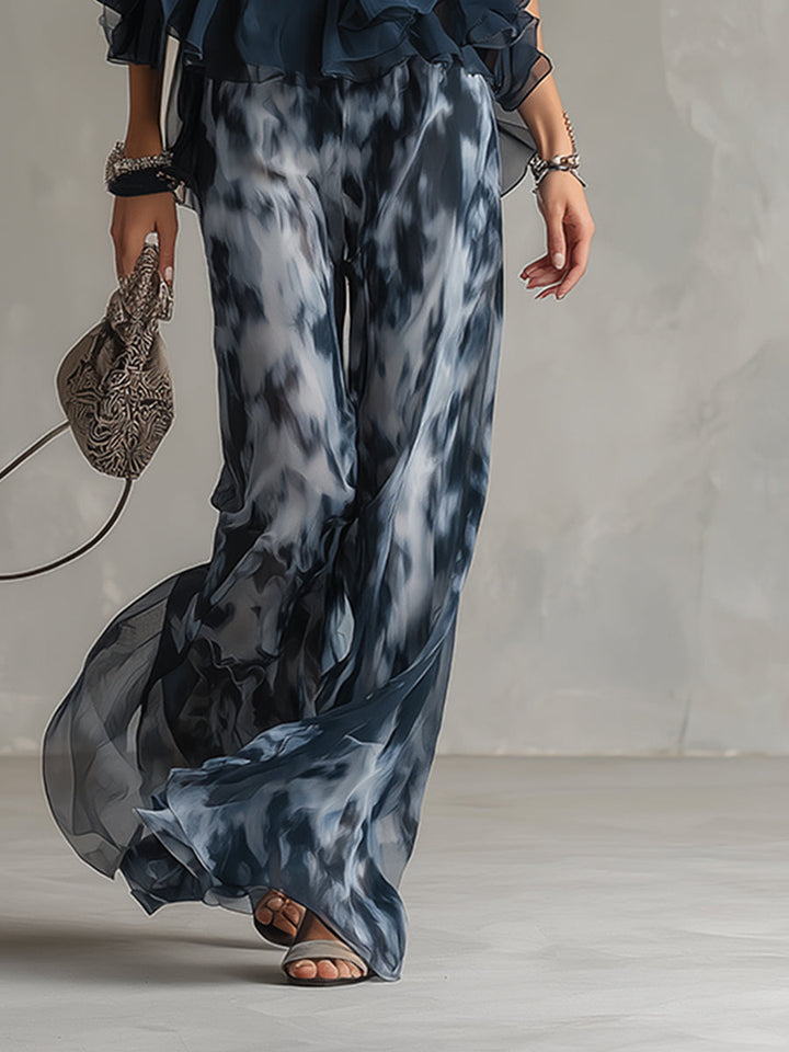 Chloé | Ensemble élégant avec haut dos nu bleu marine et pantalon large imprimé